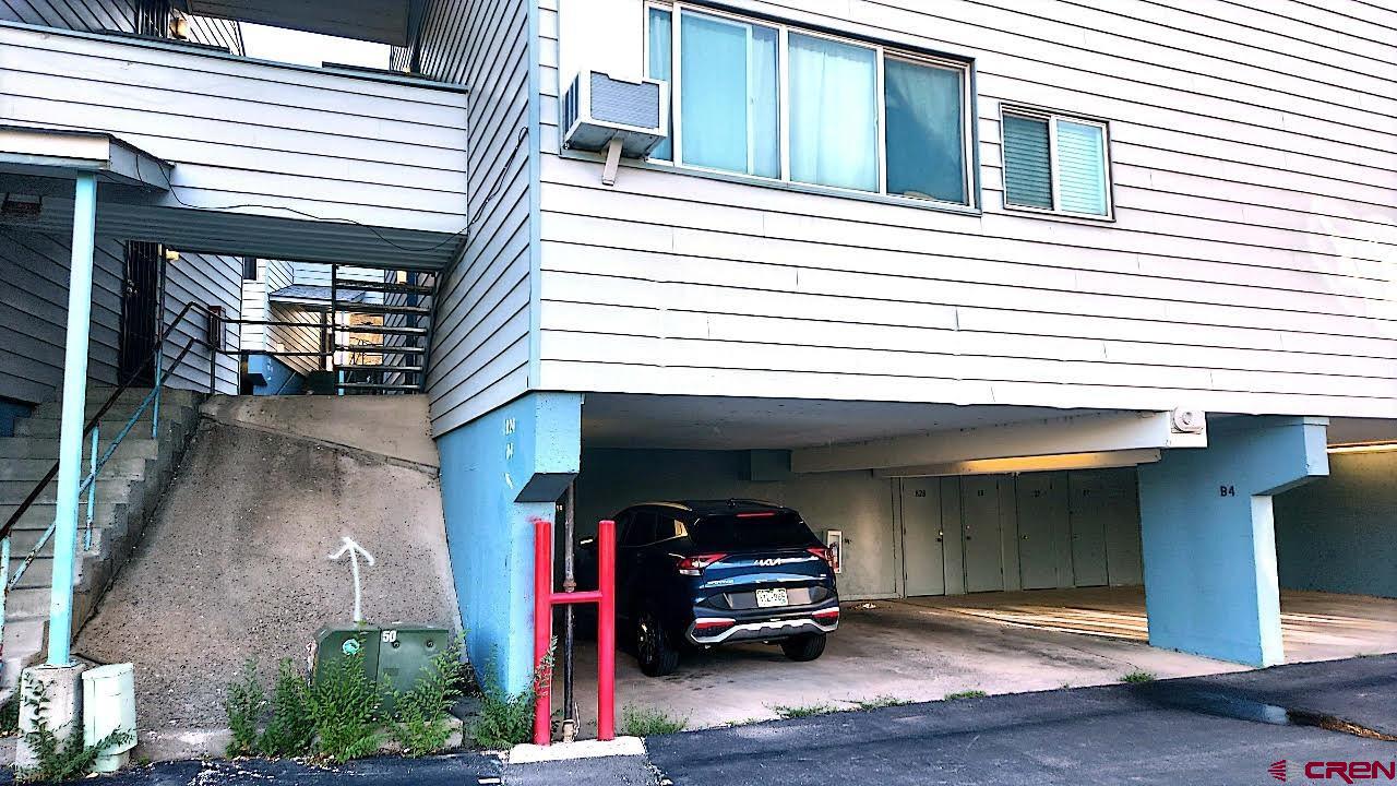a car parked in front of a building