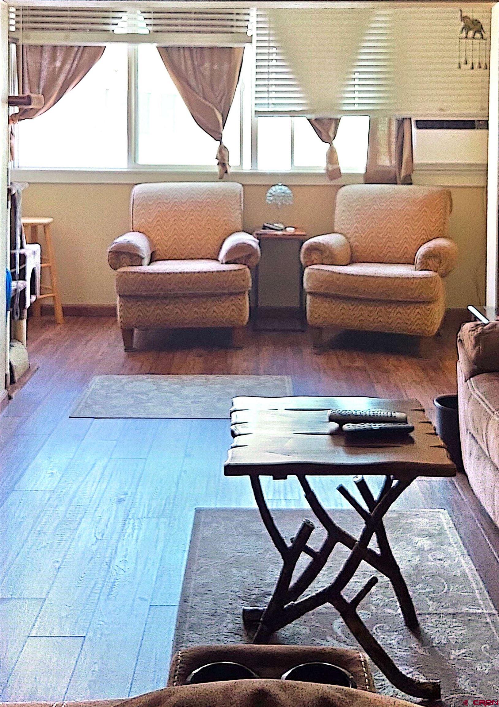 1135 Florida Road, Unit 4 Durango, CO 81301 - Photo 5 of 11 a living room with furniture and a window