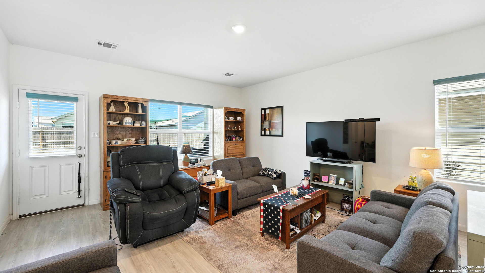 5826 Geronimo Way Seguin, TX 78155 - Photo 11 of 30 a living room with furniture and a flat screen tv
