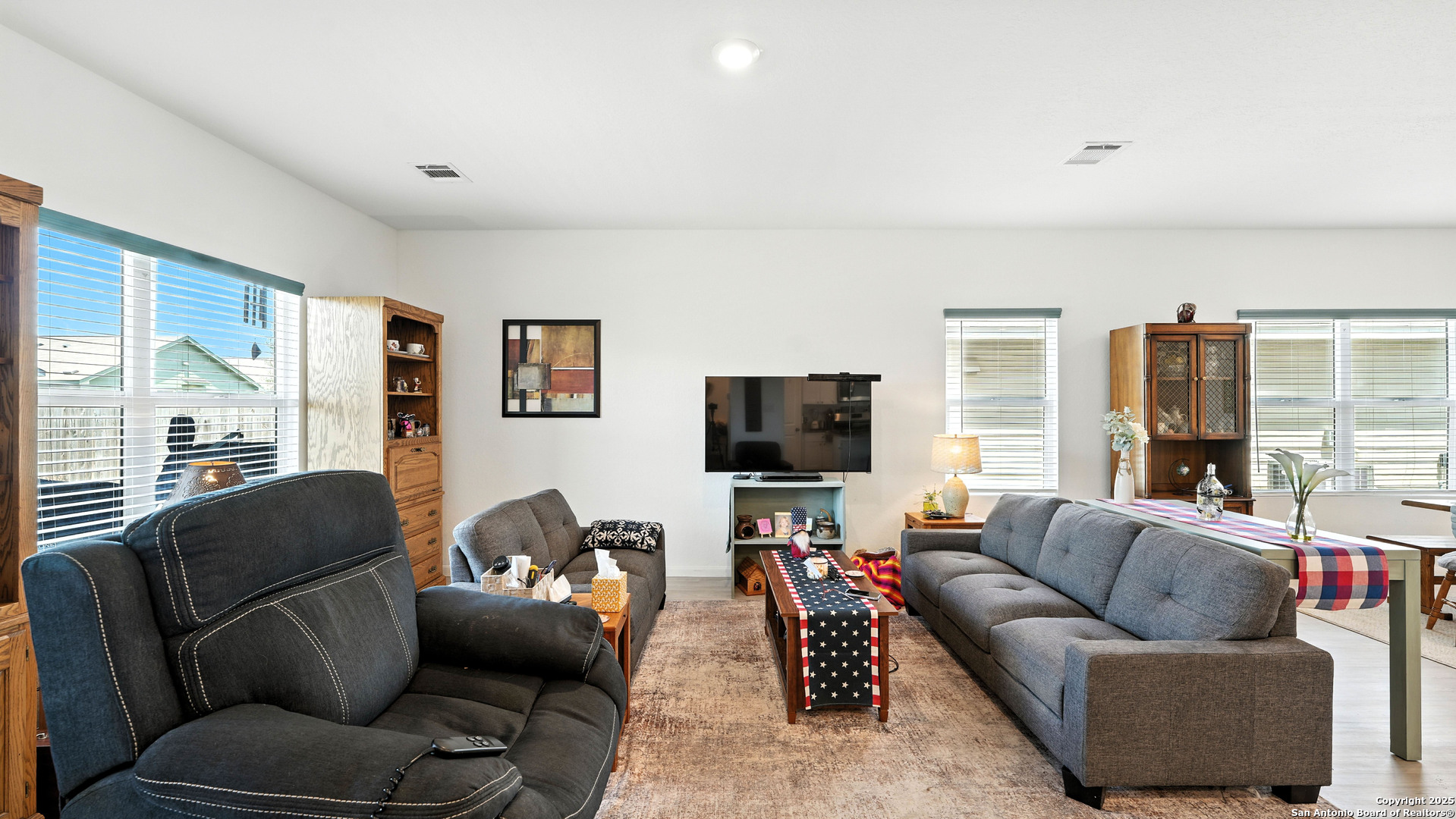 5826 Geronimo Way Seguin, TX 78155 - Photo 14 of 30 a living room with furniture and a flat screen tv