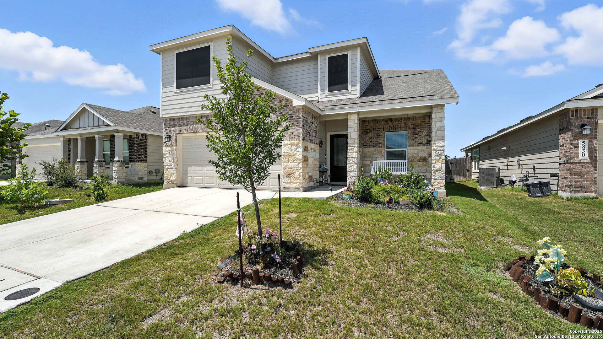 5826 Geronimo Way Seguin, TX 78155 - Photo 2 of 30 a front view of a house with a yard