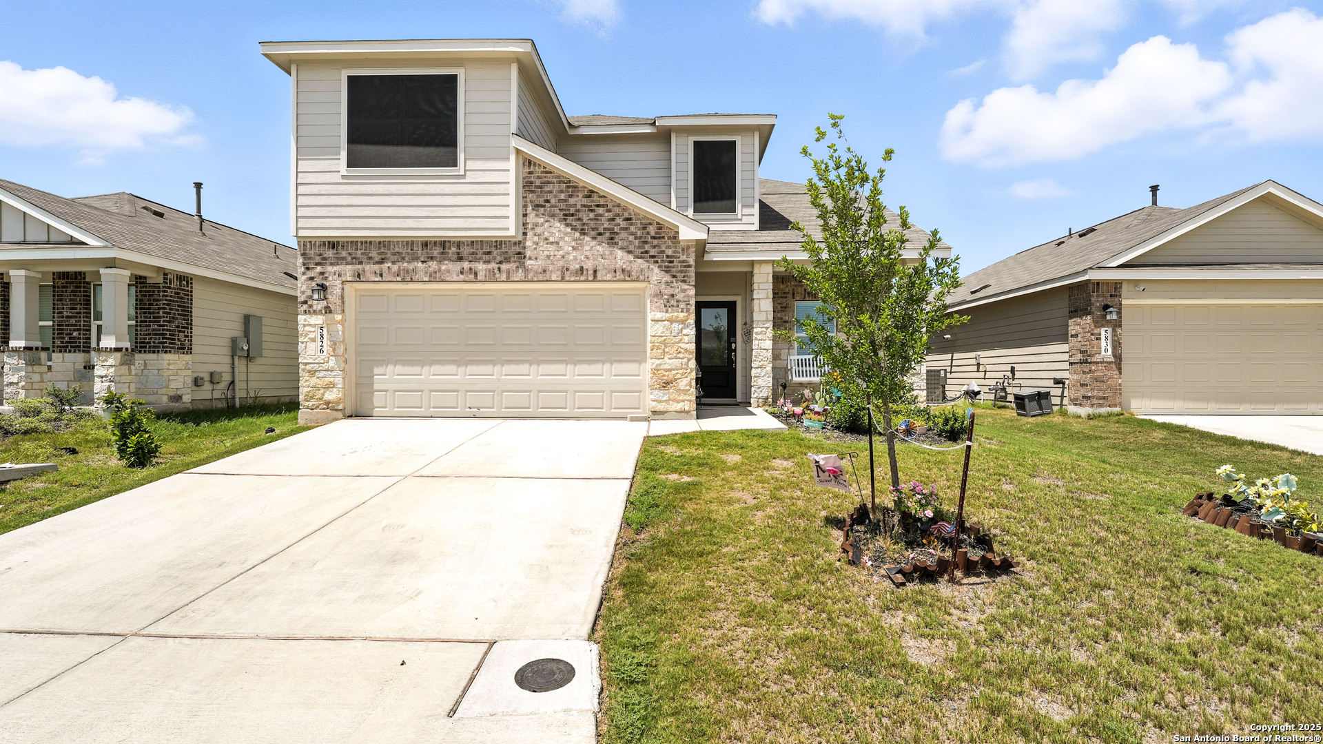 5826 Geronimo Way Seguin, TX 78155 - Photo 4 of 30 a front view of a house with garden