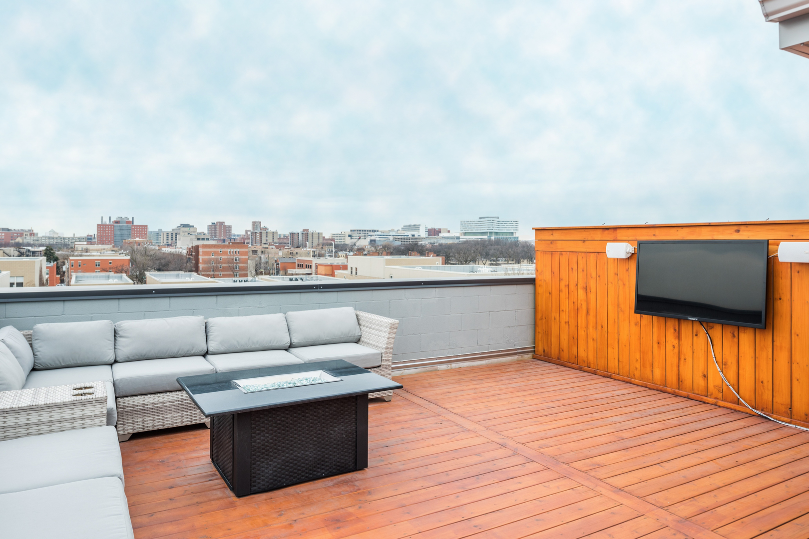 1033 South Racine Avenue, Unit 3SF Chicago, IL 60607 - Photo 17 of 19 a view of roof deck with couches and wooden floor