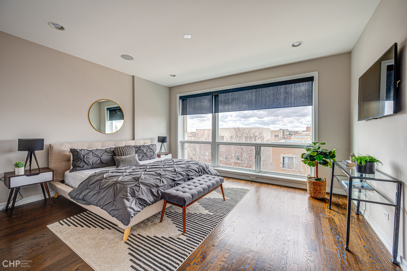 1033 South Racine Avenue, Unit 3SF Chicago, IL 60607 - Photo 8 of 19 a bedroom with a bed and a large window