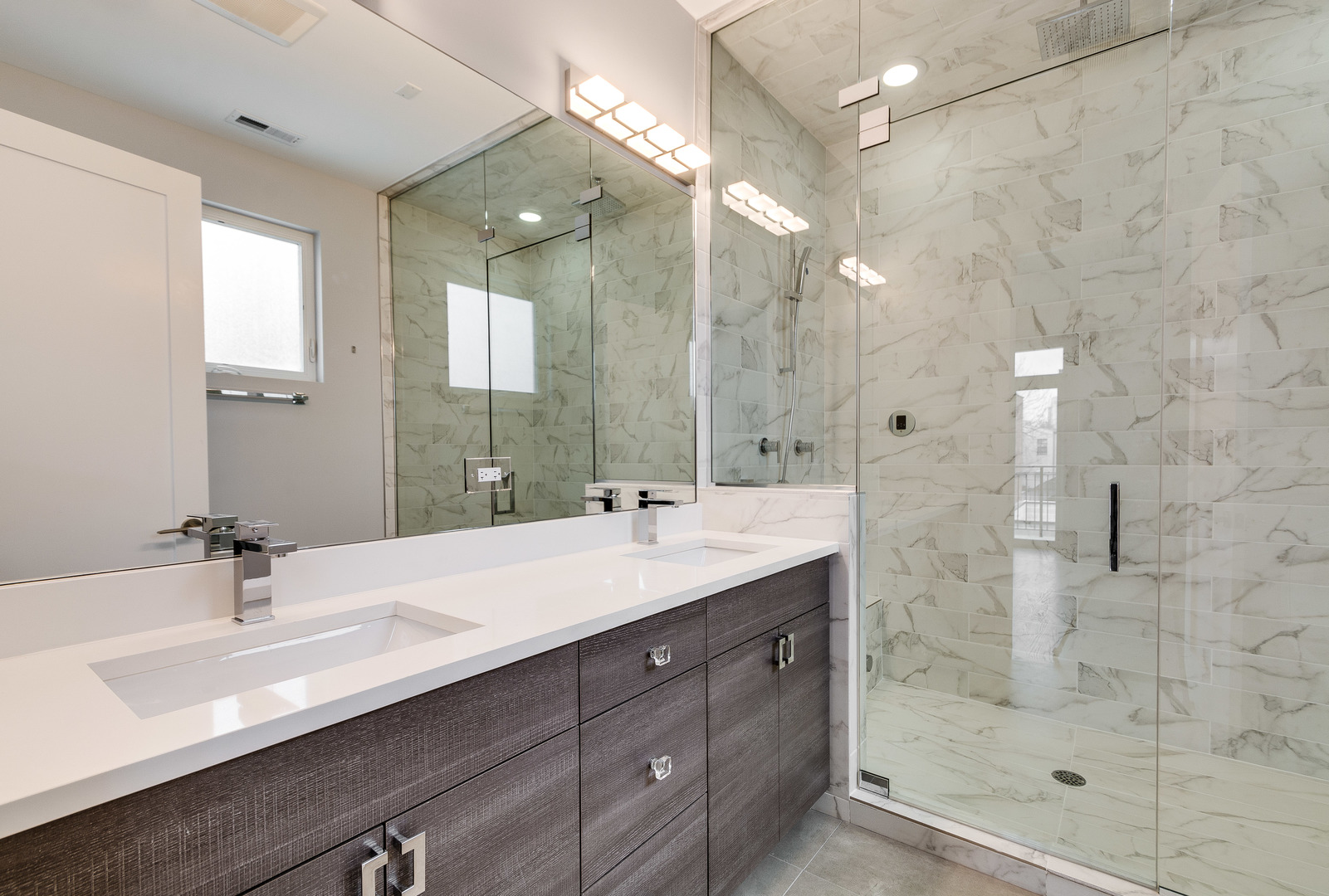 1033 South Racine Avenue, Unit 3SF Chicago, IL 60607 - Photo 10 of 19 a bathroom with a double vanity sink mirror and shower