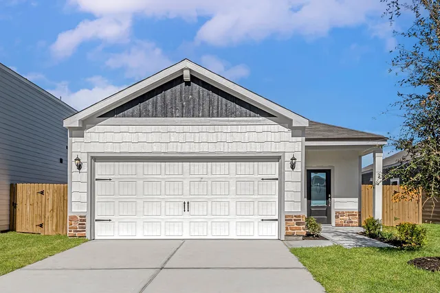 a bathroom with a sink a mirror and a bathtub