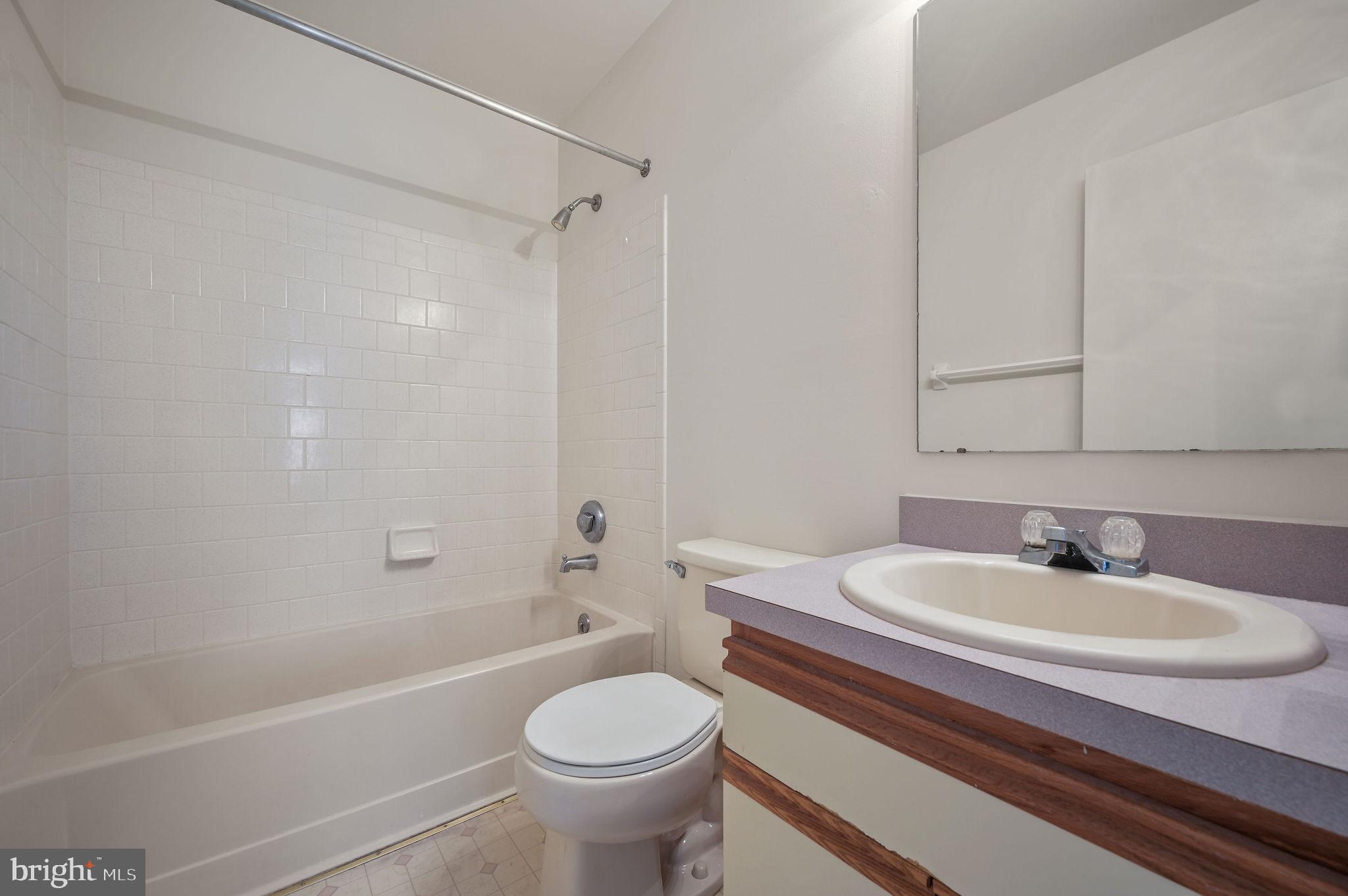 38 Heatherfield Way Dover, DE 19904 - Photo 27 of 27 a bathroom with a sink a toilet and a bathtub