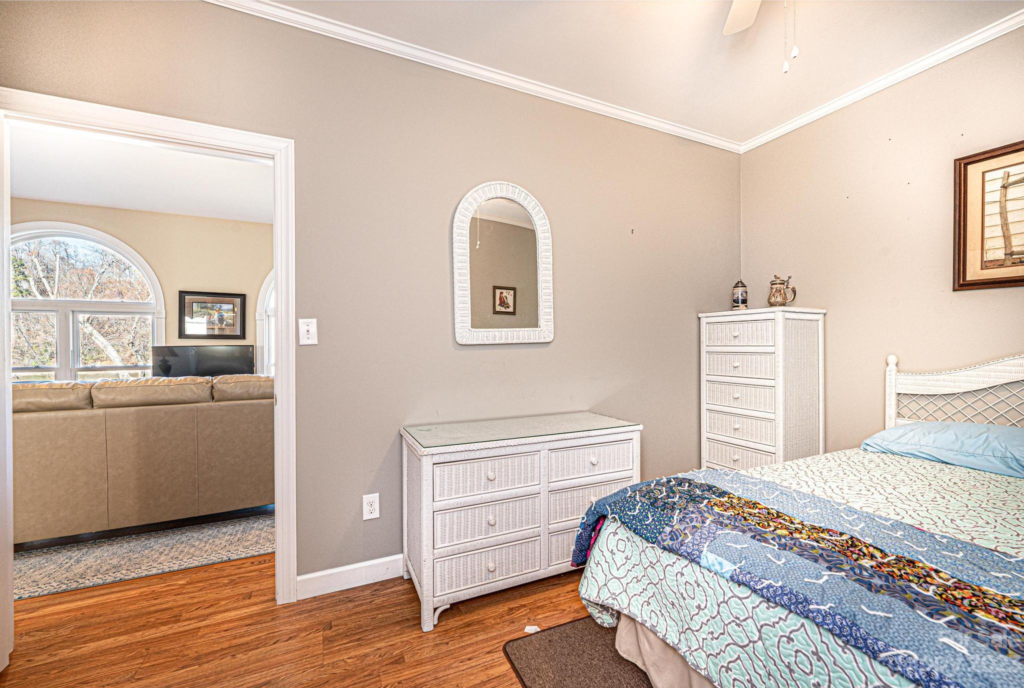 209 Catawba Avenue Hickory, NC 28601 - Photo 17 of 28 a bedroom with a bed and a dresser