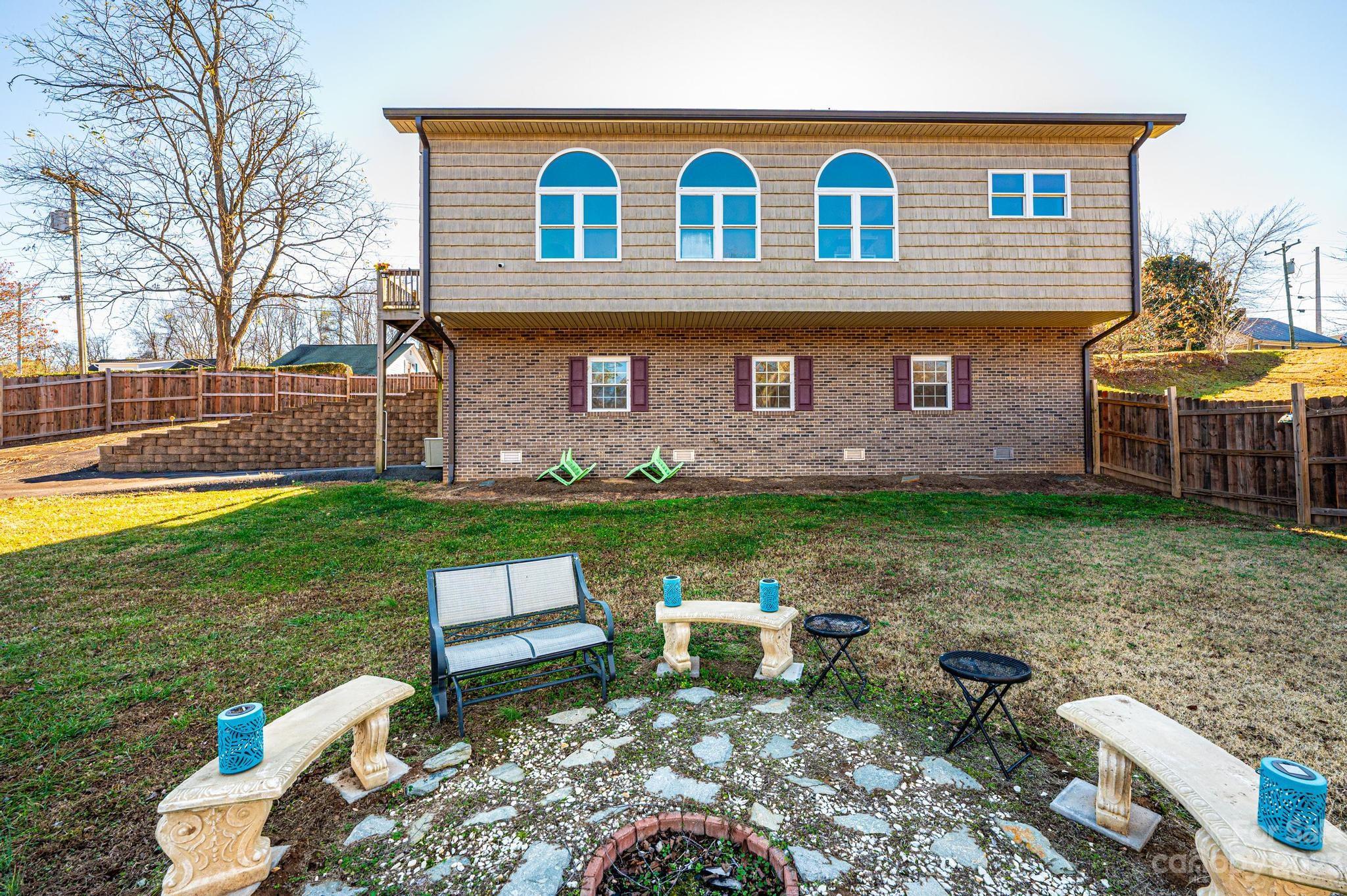209 Catawba Avenue Hickory, NC 28601 - Photo 20 of 28 a front view of a house with garden