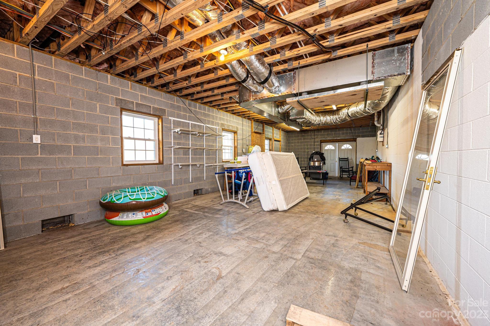 209 Catawba Avenue Hickory, NC 28601 - Photo 27 of 28 a view of an empty room with windows