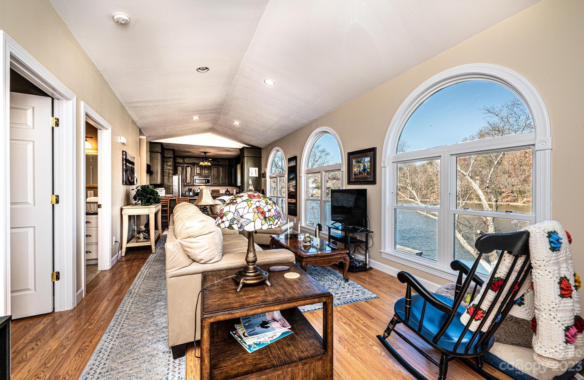 209 Catawba Avenue Hickory, NC 28601 - Photo 4 of 28 a view of a livingroom with furniture a fireplace