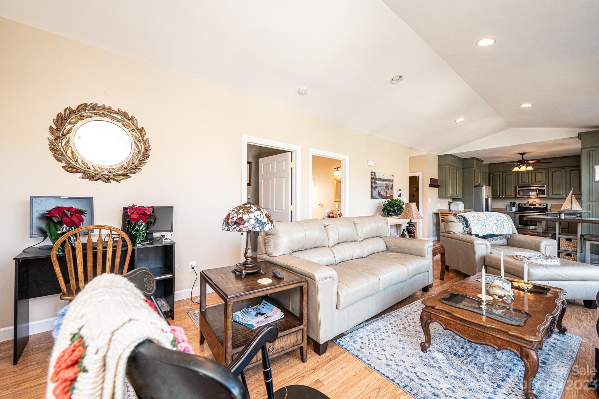 209 Catawba Avenue Hickory, NC 28601 - Photo 5 of 28 a living room with furniture kitchen view and a table