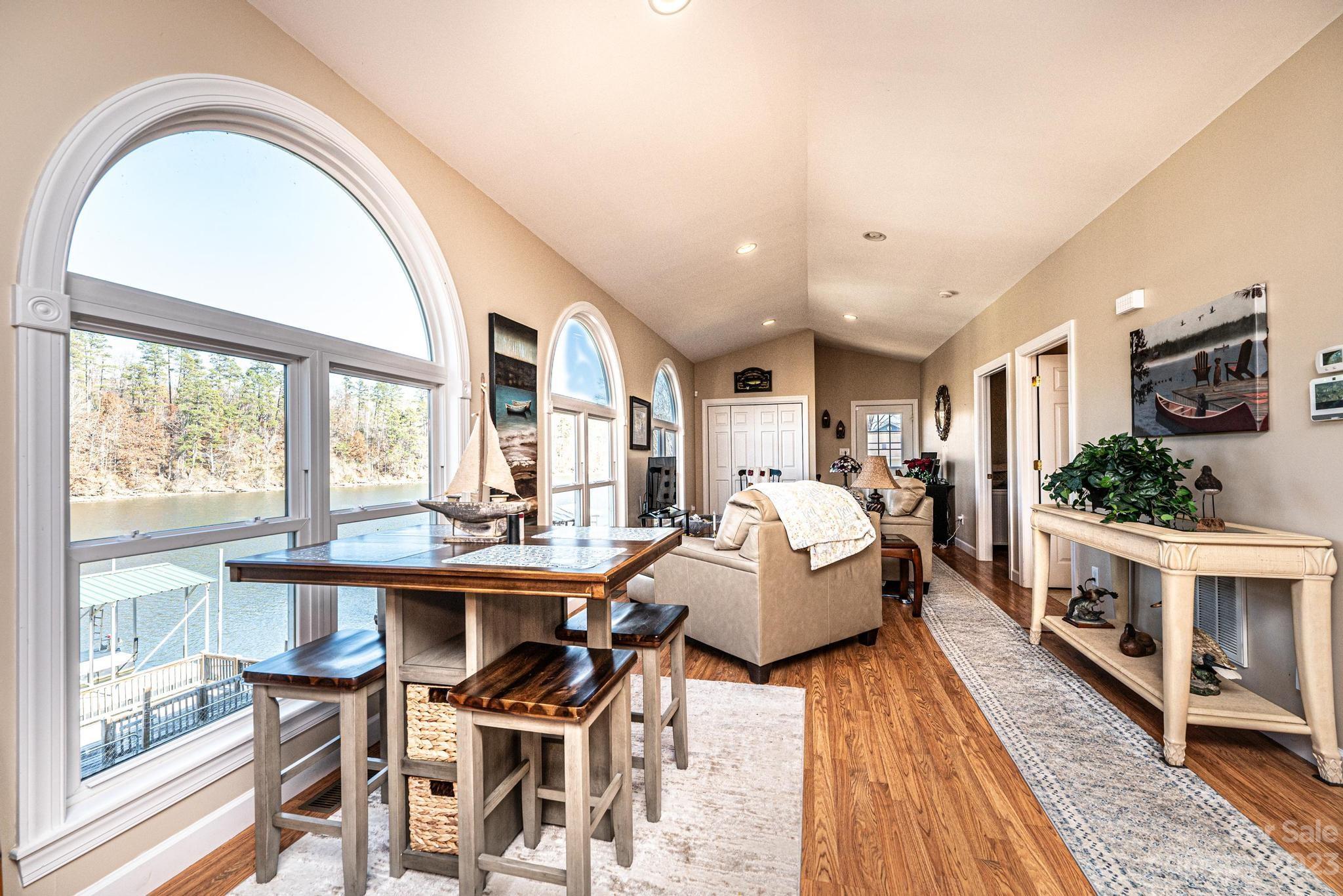 209 Catawba Avenue Hickory, NC 28601 - Photo 6 of 28 a living room with fireplace furniture and a large window