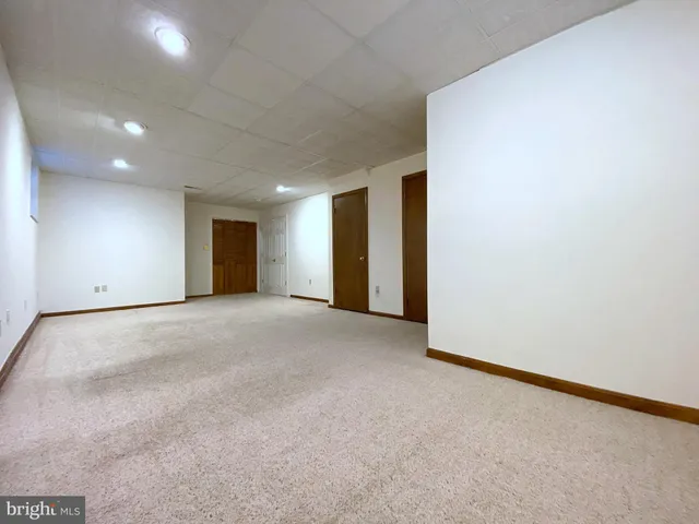 a bathroom with a shower and a toilet