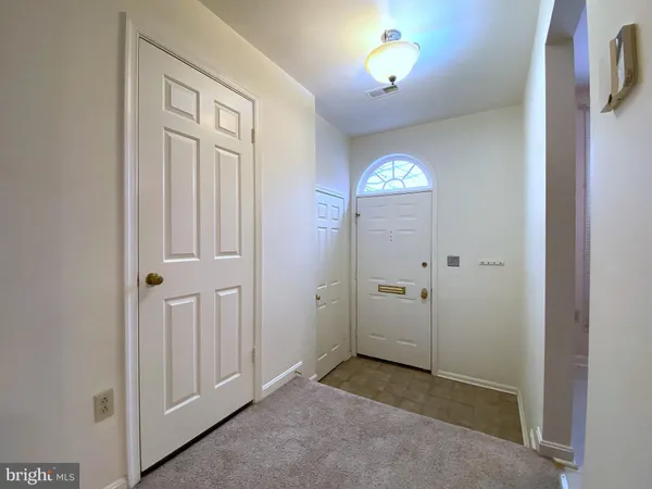 a kitchen with a sink cabinets and appliances
