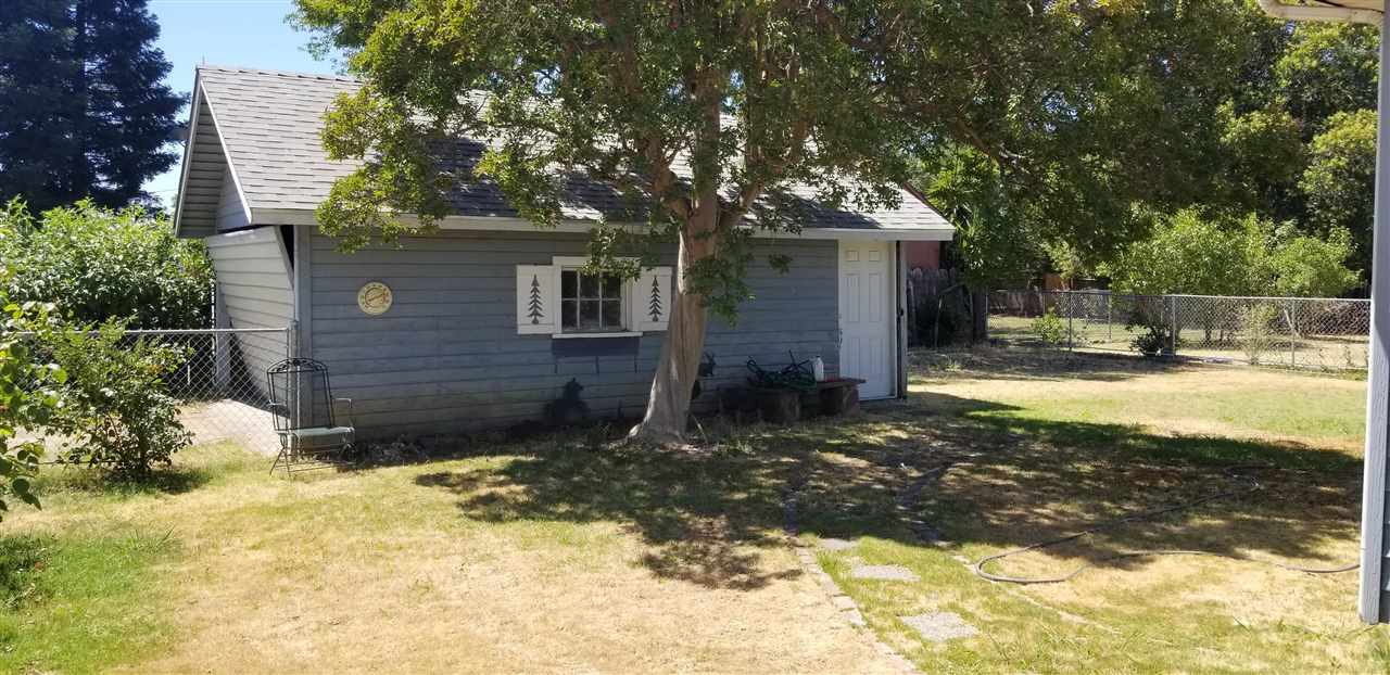 381 Aleut Street Biggs, CA 95917 - Photo 8 of 35 a view of a house with a yard