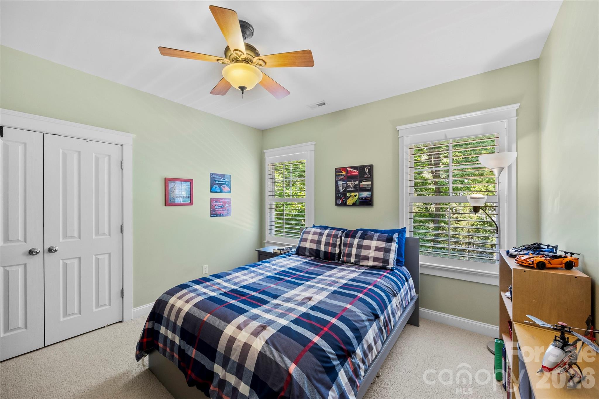 606 Andover Lane Tega Cay, SC 29708 - Photo 29 of 48 a bedroom with a bed and a window