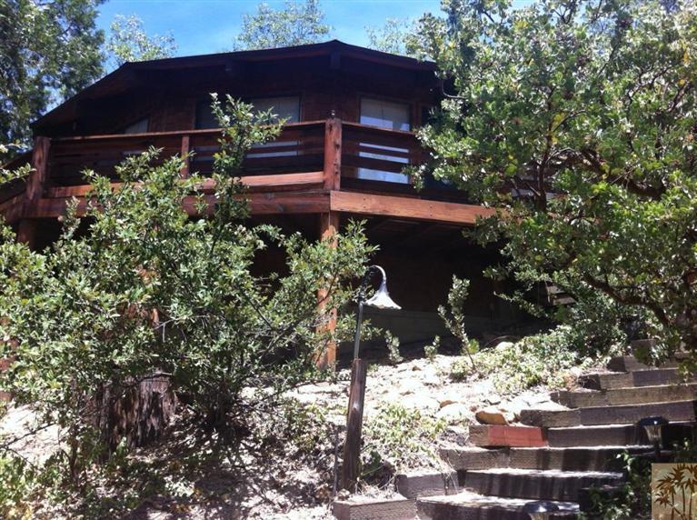 25160 Cougar Road Idyllwild, CA 92549 - Photo 1 of 17 a view of a backyard of the house