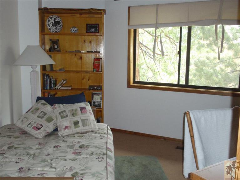 25160 Cougar Road Idyllwild, CA 92549 - Photo 16 of 17 a bedroom with a bed and large window