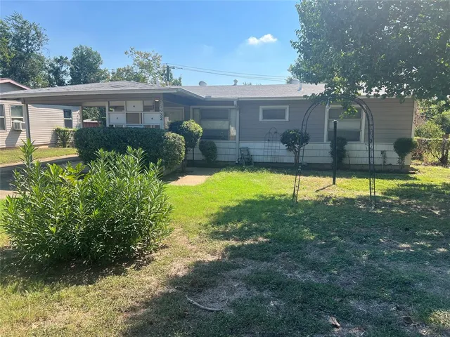 a view of a house with a swimming pool