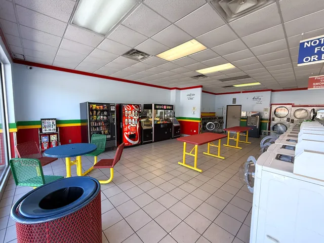 a room with gym equipment and a view of store room