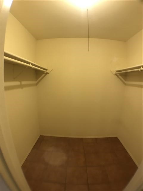 630 Maiden Lane, Unit A Austin, TX 78705 - Photo 11 of 12 a view of a room with racks on the wall