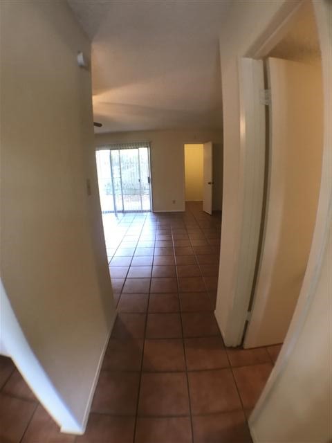 630 Maiden Lane, Unit A Austin, TX 78705 - Photo 2 of 12 a view of empty room with wooden floor and fan