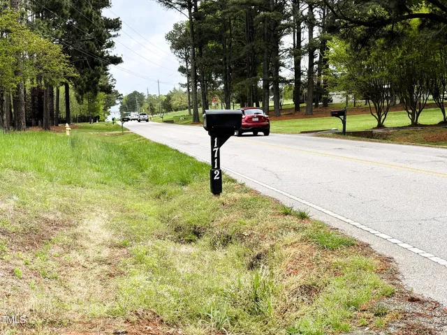 a building with trees in the background