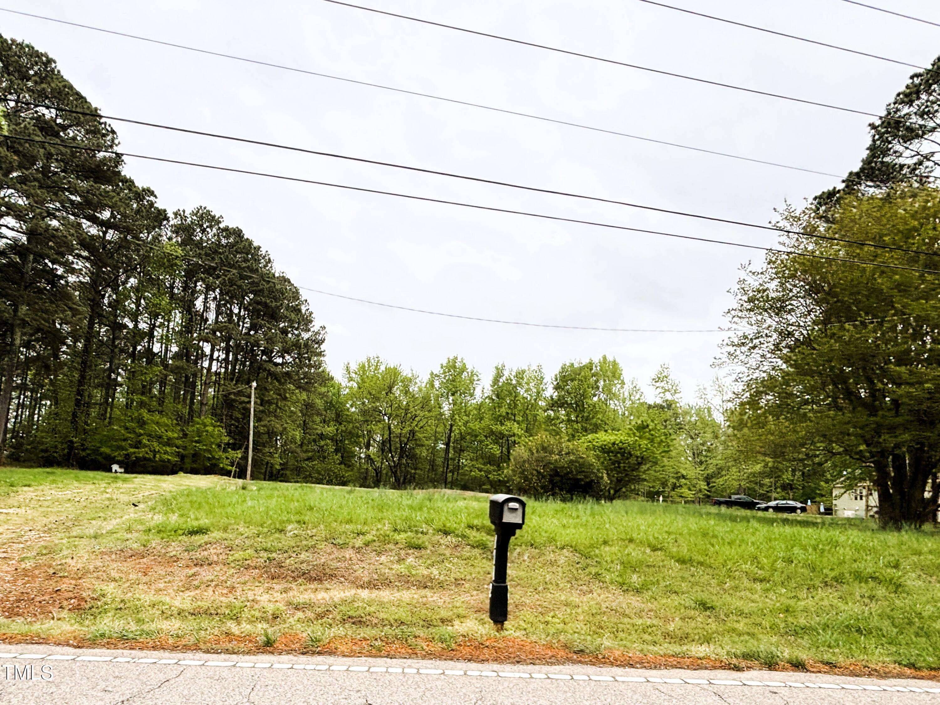 1712 Avent Ferry Road Holly Springs, NC 27540 - Photo 2 of 6 a view of a yard