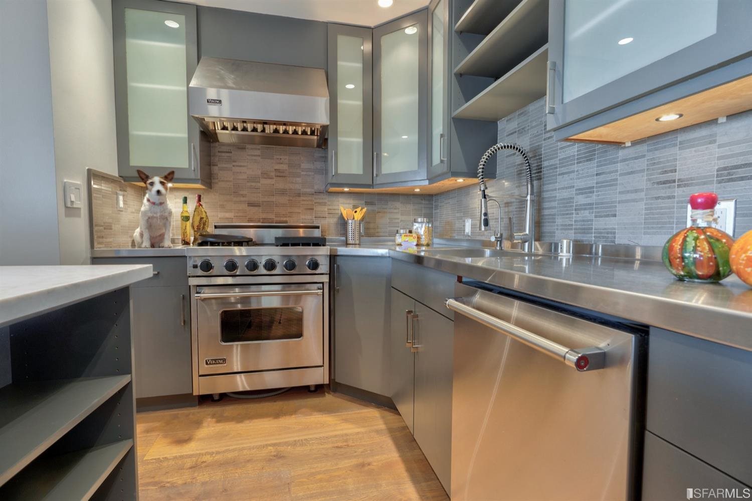 15 Perego Terrace, Unit 2 San Francisco, CA 94131 - Photo 11 of 45 a kitchen with granite countertop a sink stainless steel appliances and cabinets
