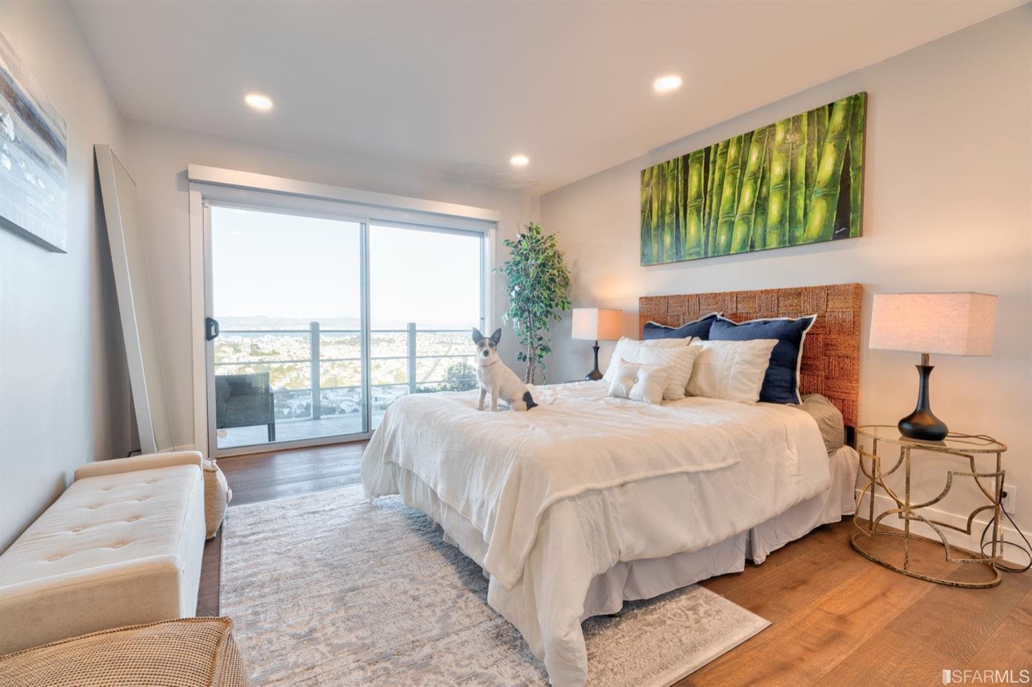 15 Perego Terrace, Unit 2 San Francisco, CA 94131 - Photo 17 of 45 a spacious bedroom with a bed and a large window