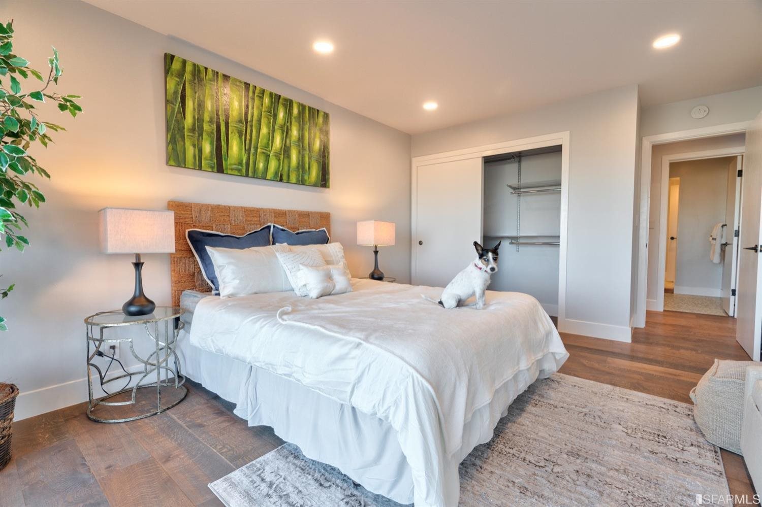 15 Perego Terrace, Unit 2 San Francisco, CA 94131 - Photo 19 of 45 a bedroom with a bed and a mirror