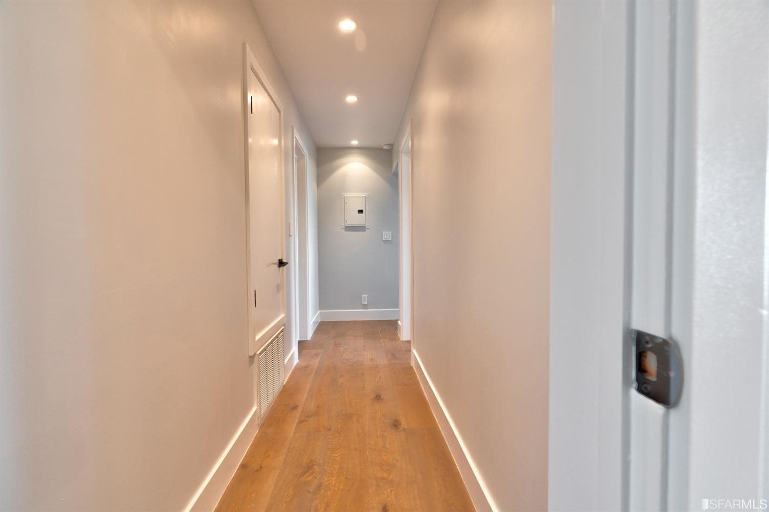 15 Perego Terrace, Unit 2 San Francisco, CA 94131 - Photo 27 of 45 a view of a hallway with wooden floor