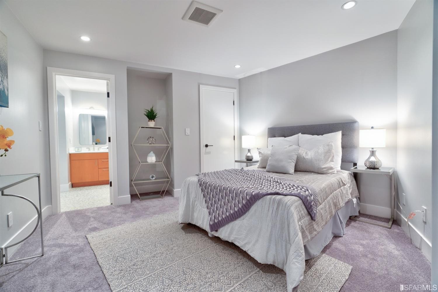 15 Perego Terrace, Unit 2 San Francisco, CA 94131 - Photo 32 of 45 a spacious bedroom with a bed and glass door