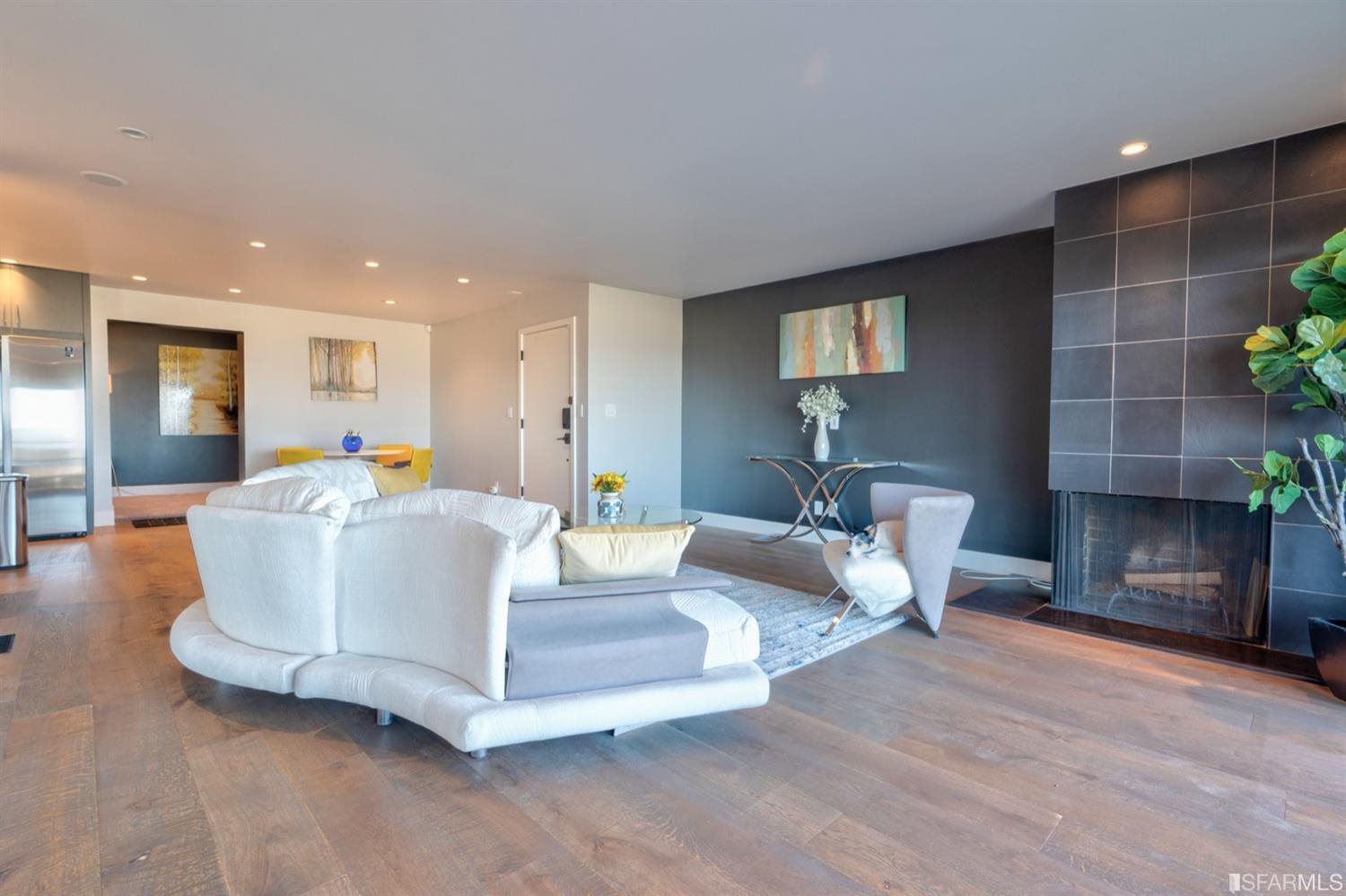 15 Perego Terrace, Unit 2 San Francisco, CA 94131 - Photo 5 of 45 a living room with furniture and a fireplace