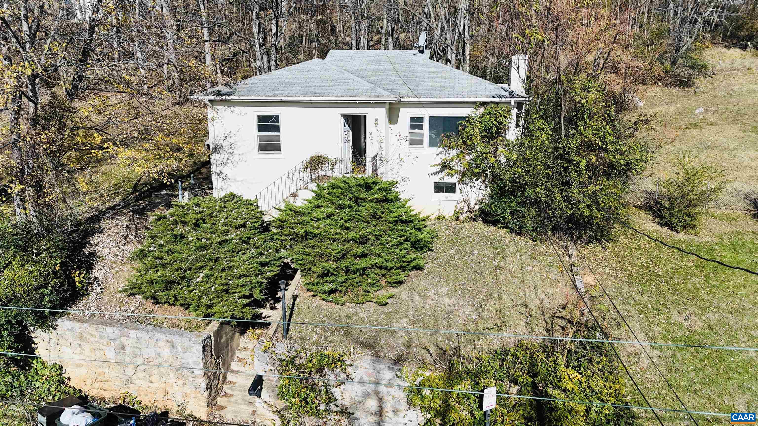 1323 Jackson Street Staunton, VA 24401 - Photo 59 of 67 a front view of a house with a yard and garage