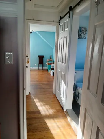 a view of a hallway view with staircase