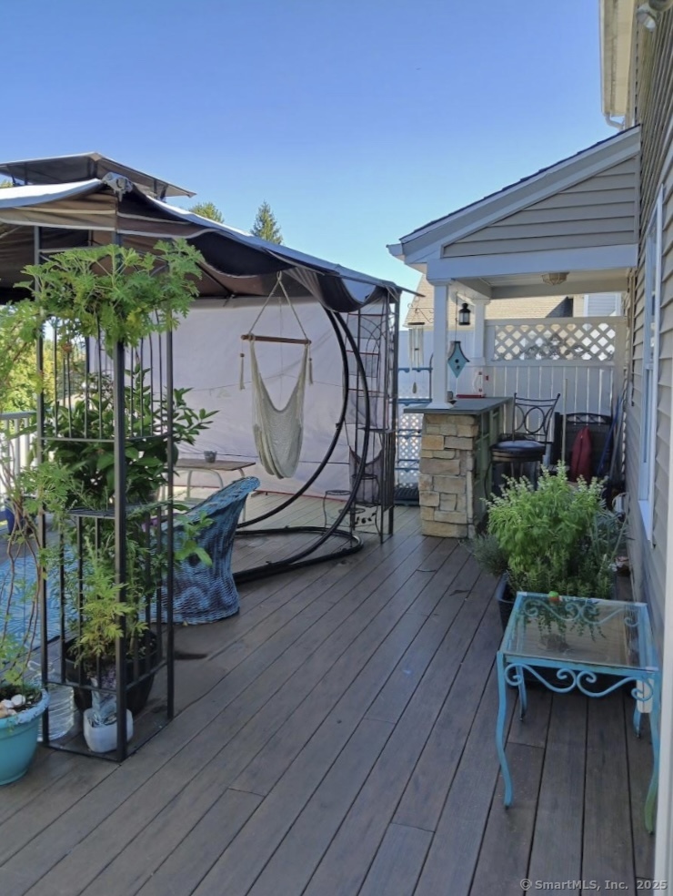 70 Lawlor Street Waterbury, CT 06708 - Photo 23 of 39 a backyard of a house with seating space