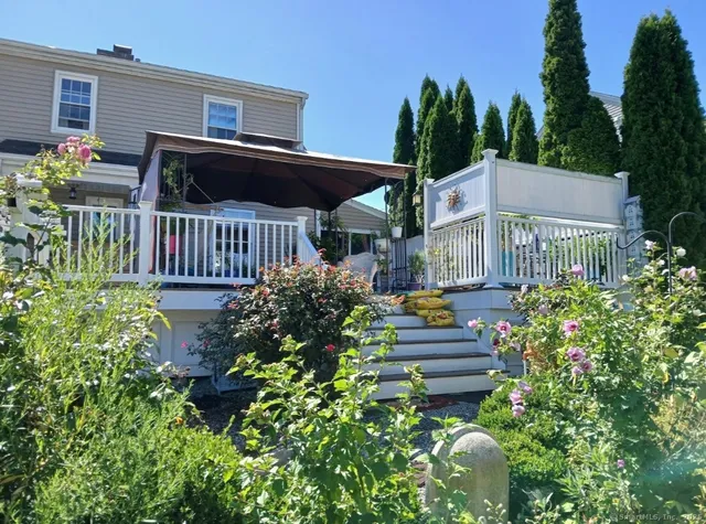 a house view with a garden space