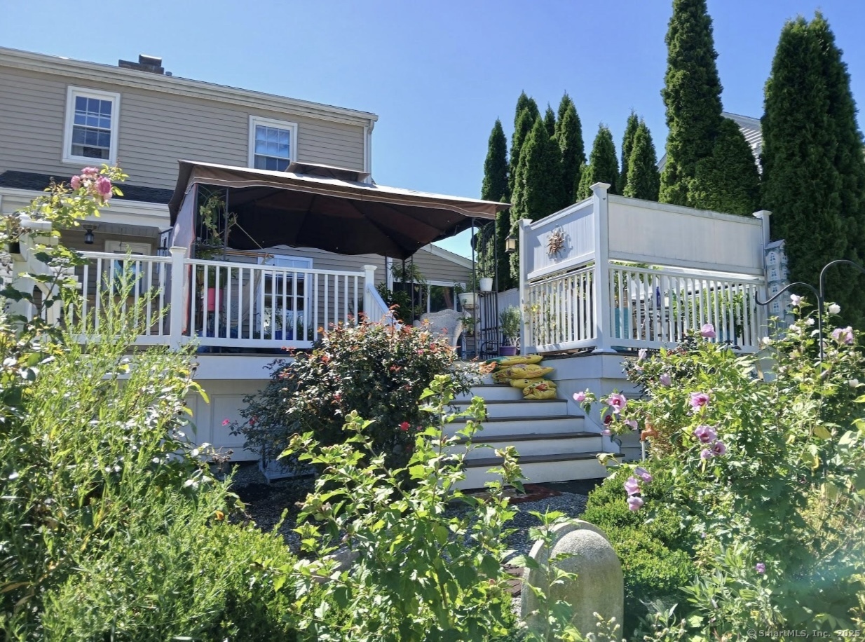 70 Lawlor Street Waterbury, CT 06708 - Photo 28 of 39 a house view with a garden space