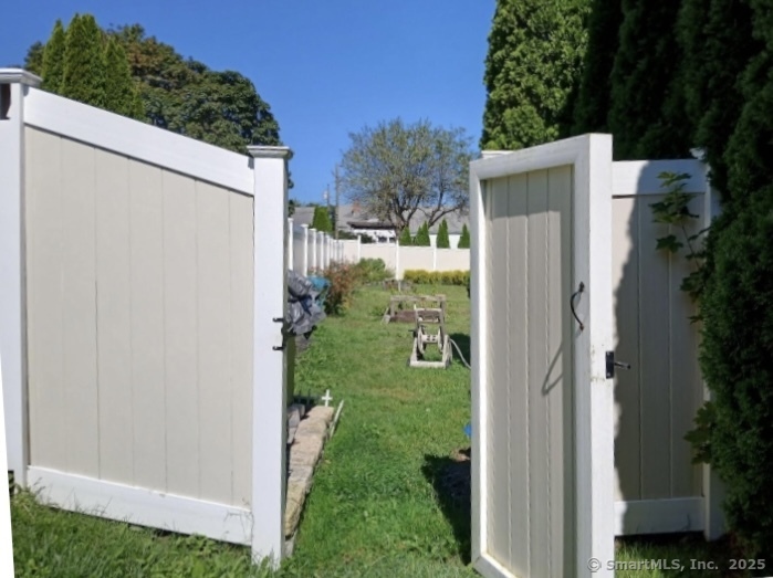 70 Lawlor Street Waterbury, CT 06708 - Photo 32 of 39 a view of a house with backyard