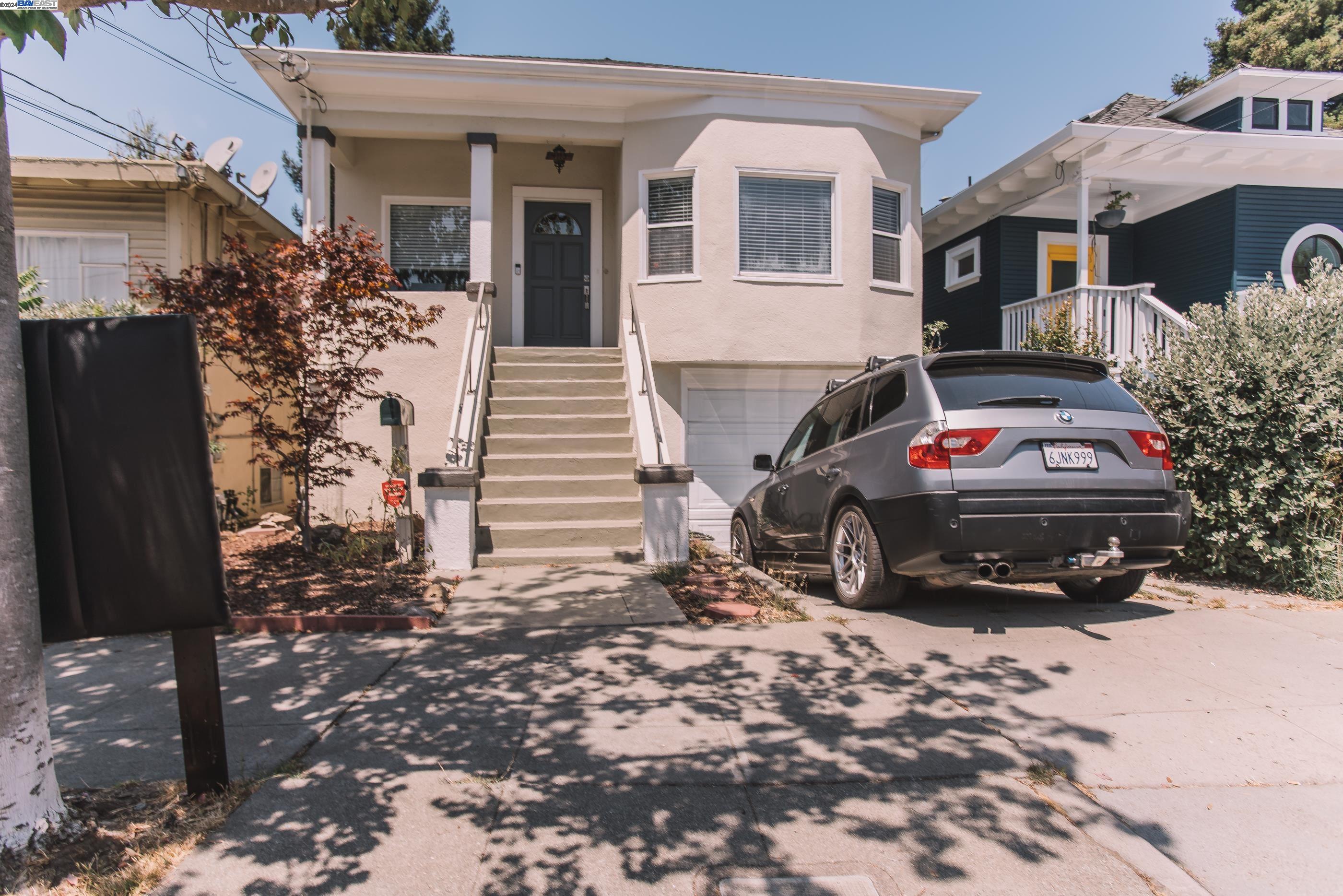 4113 Gilbert Street Oakland, CA 94611 - Photo 17 of 22 a car parked in front of a house