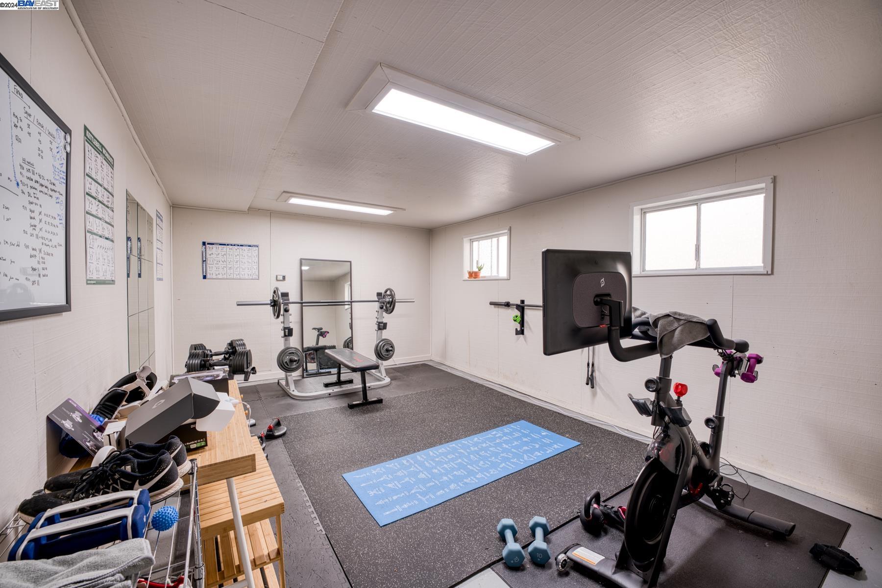 4113 Gilbert Street Oakland, CA 94611 - Photo 22 of 22 a view of a room with gym equipment