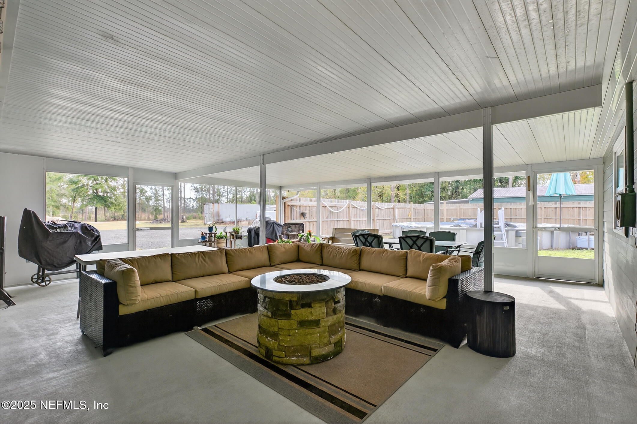 44108 Becker Avenue Callahan, FL 32011 - Photo 16 of 28 a living room with furniture and a large window