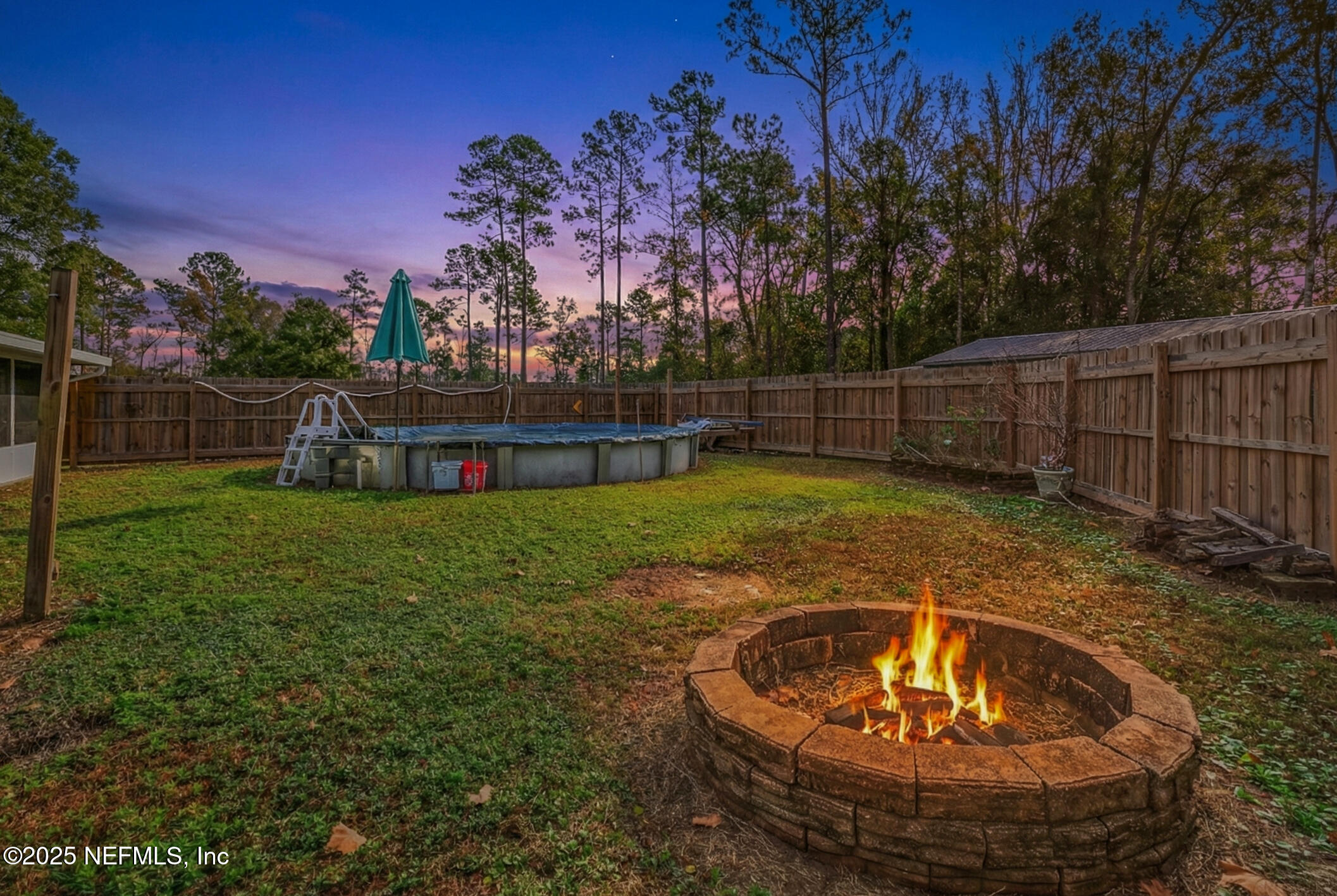 44108 Becker Avenue Callahan, FL 32011 - Photo 2 of 28 a view of a swimming pool with a yard