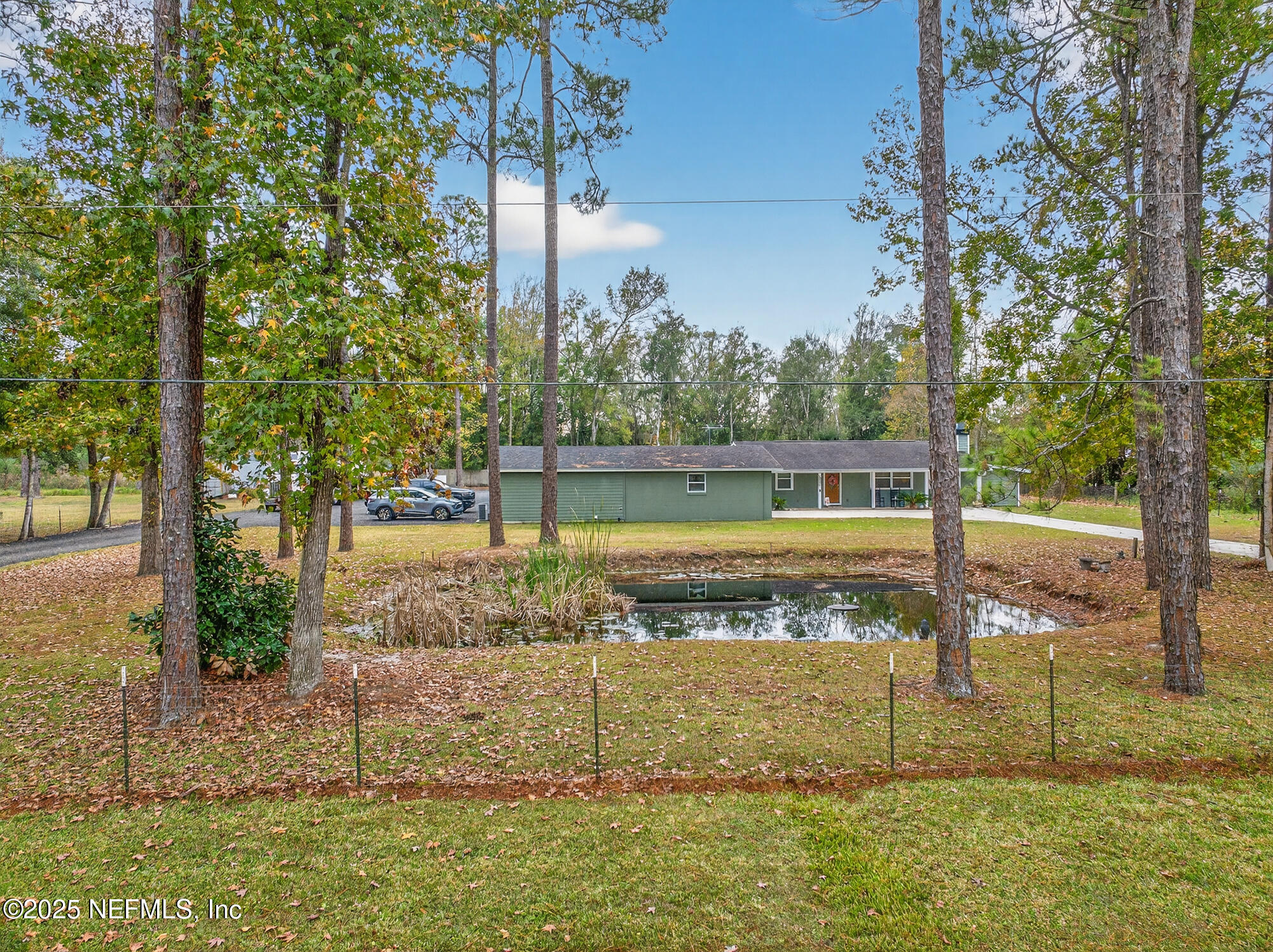 44108 Becker Avenue Callahan, FL 32011 - Photo 3 of 28 a view of a back yard with green space