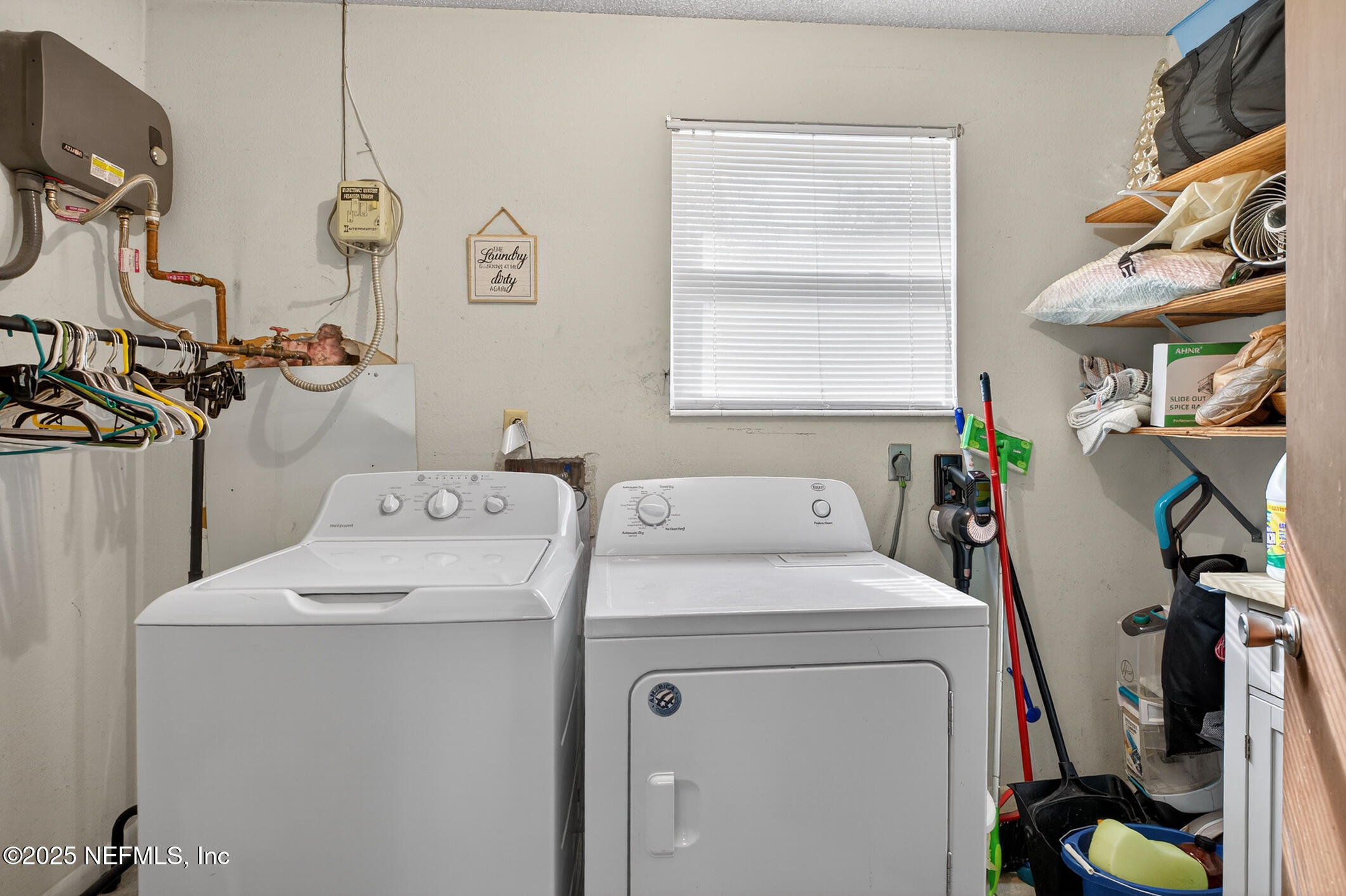 44108 Becker Avenue Callahan, FL 32011 - Photo 9 of 28 a utility room with dryer and washer