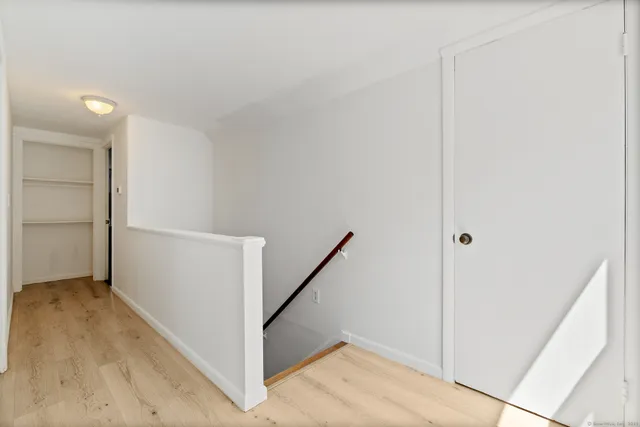 a view of hallway with stairs