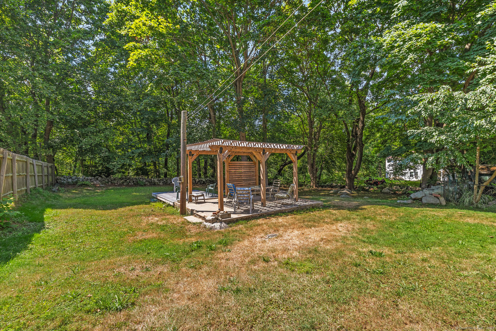 24 Pine Street Waterford, CT 06385 - Photo 18 of 39 a view of a house with backyard and sitting area