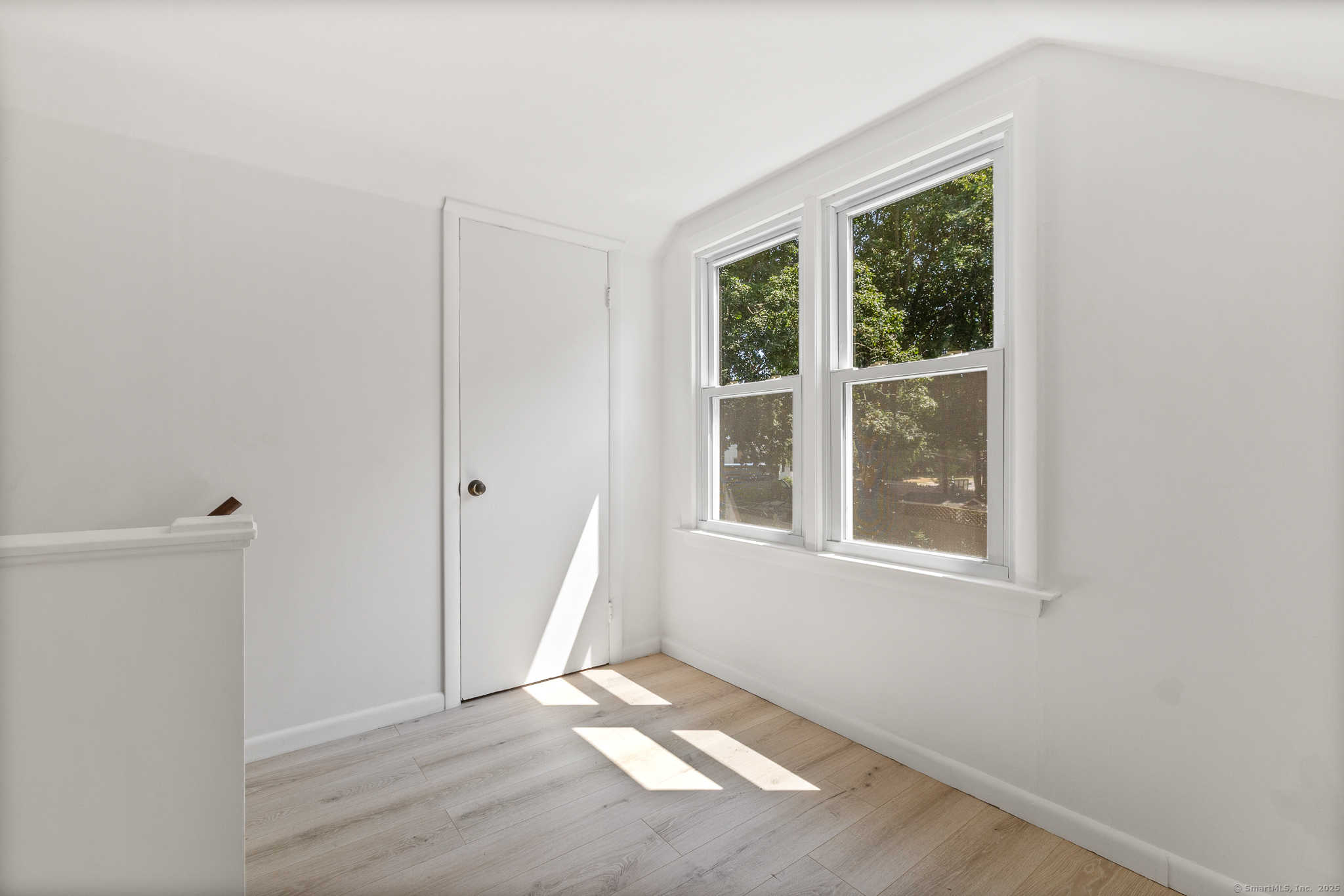 24 Pine Street Waterford, CT 06385 - Photo 9 of 39 an empty room with windows